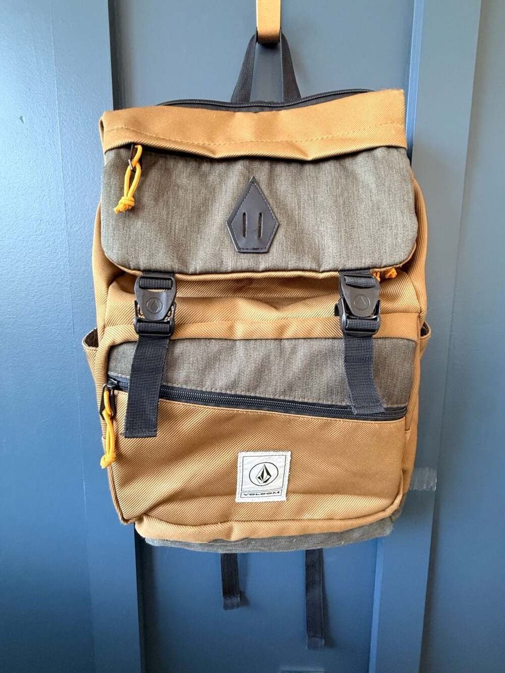 Volcom Brown and Green Flap Backpack with Buckle Straps excellent condition.